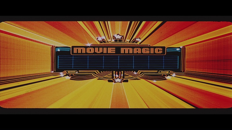 Un graphique orange et rouge vif avec un texte orange qui indique Movie Magic.