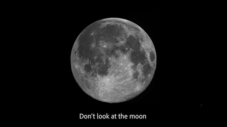 image of the moon with text reading "don't look at the moon"