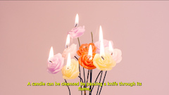 image of flower candles burning with text underneath